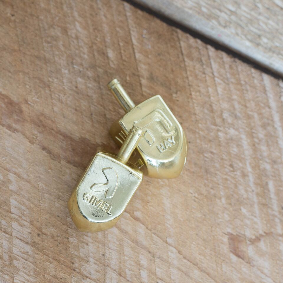 A Bunch and Then Some Dreidels- Gold - Peace Love Light Shop